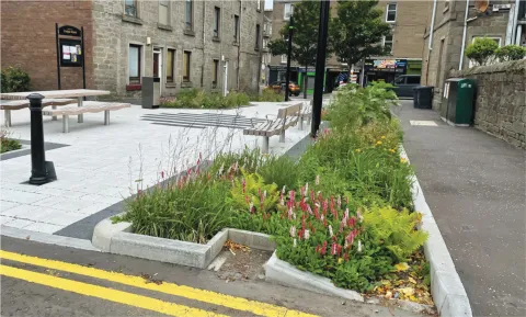 Residential Street with community runoff retention solutions - Photo Credit: Abertay University Residential Street with community runoff retention solutions - Photo Credit: Abertay University