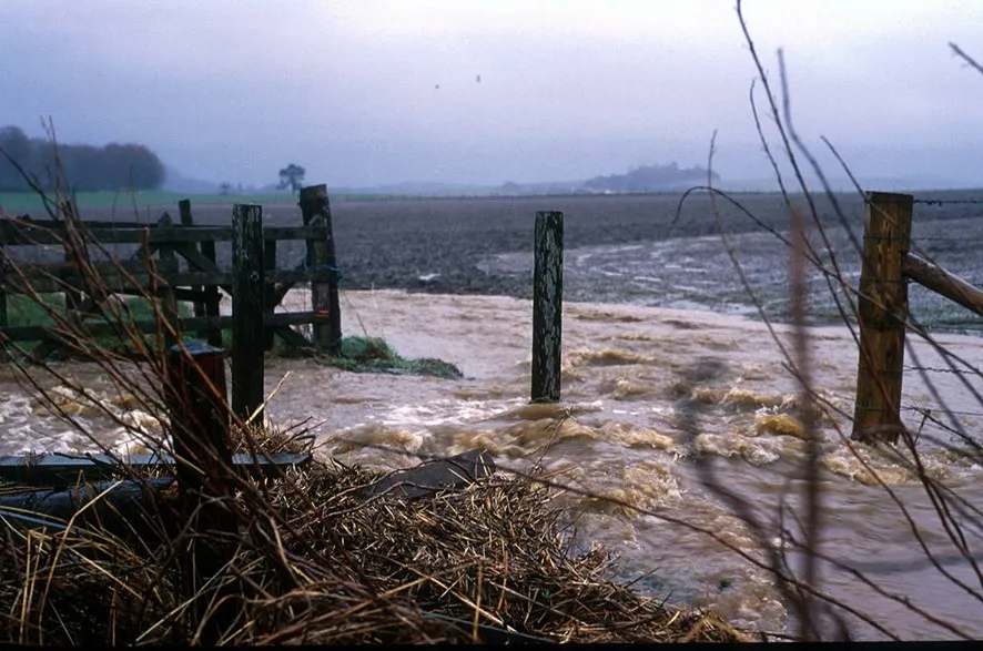 Swollen river with sediment. Photograph courtesy of Nikki Baggaley